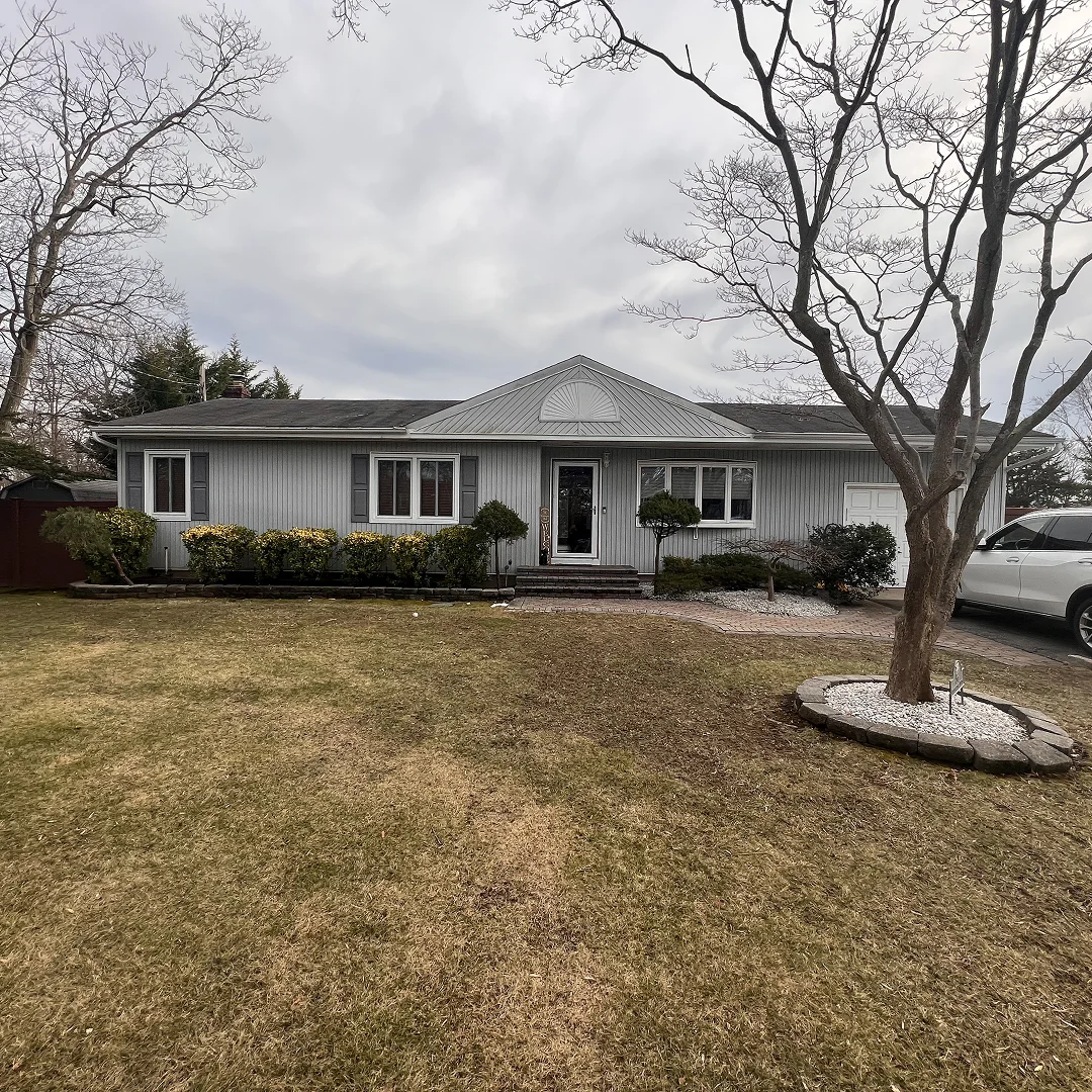 Completed siding, window and exterior work by Iron Mike Construction