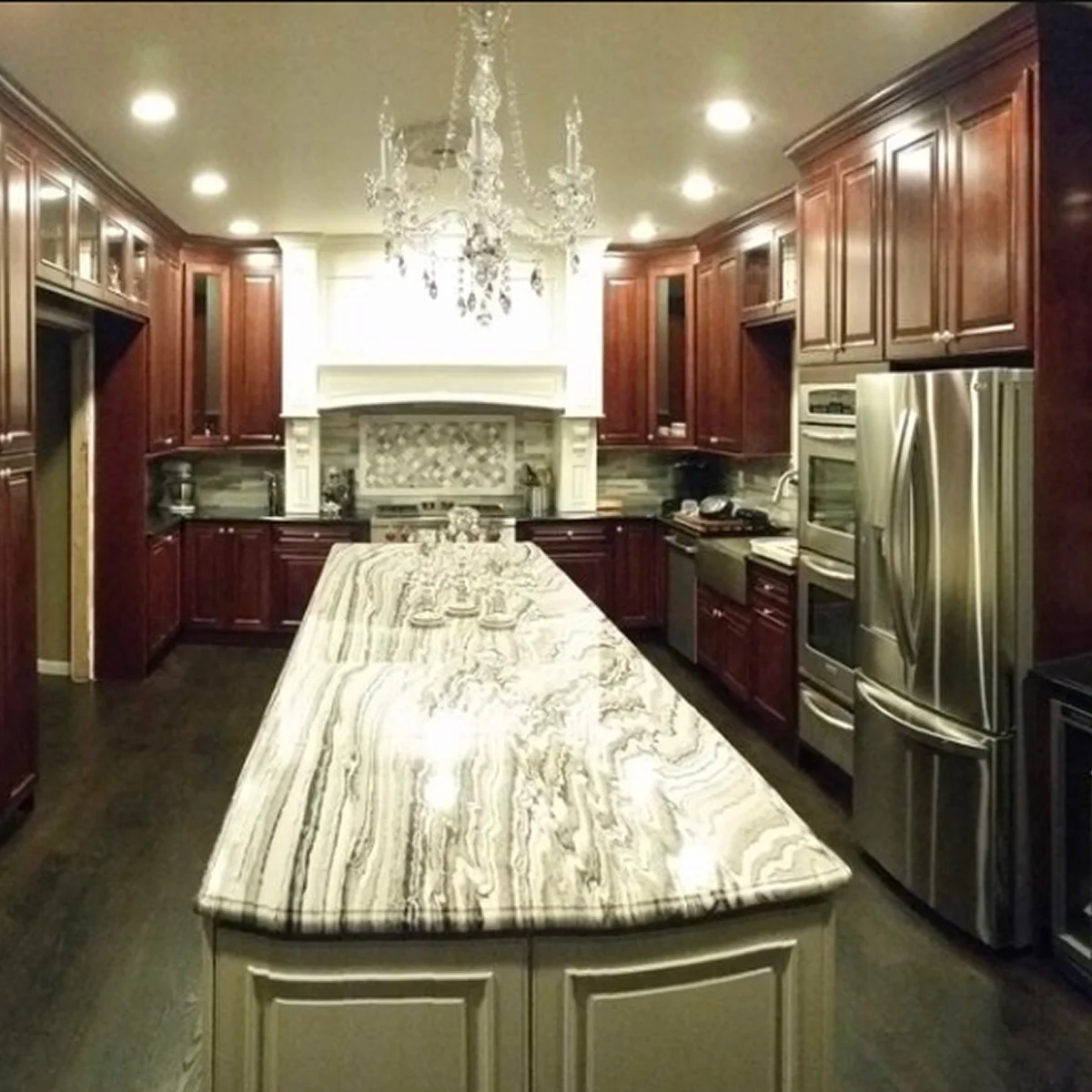 Cherry wood kitchen with marble island