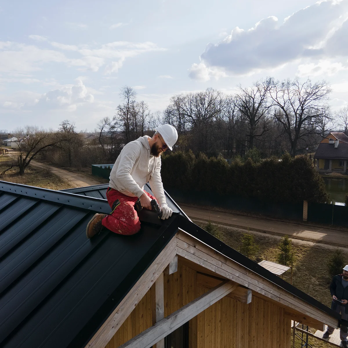 Licensed roofer working with safety equipment