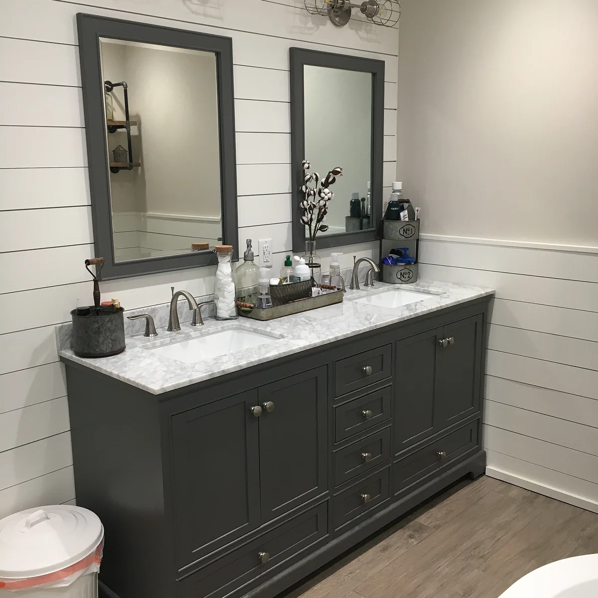 Gray double vanity and shiplap bathroom