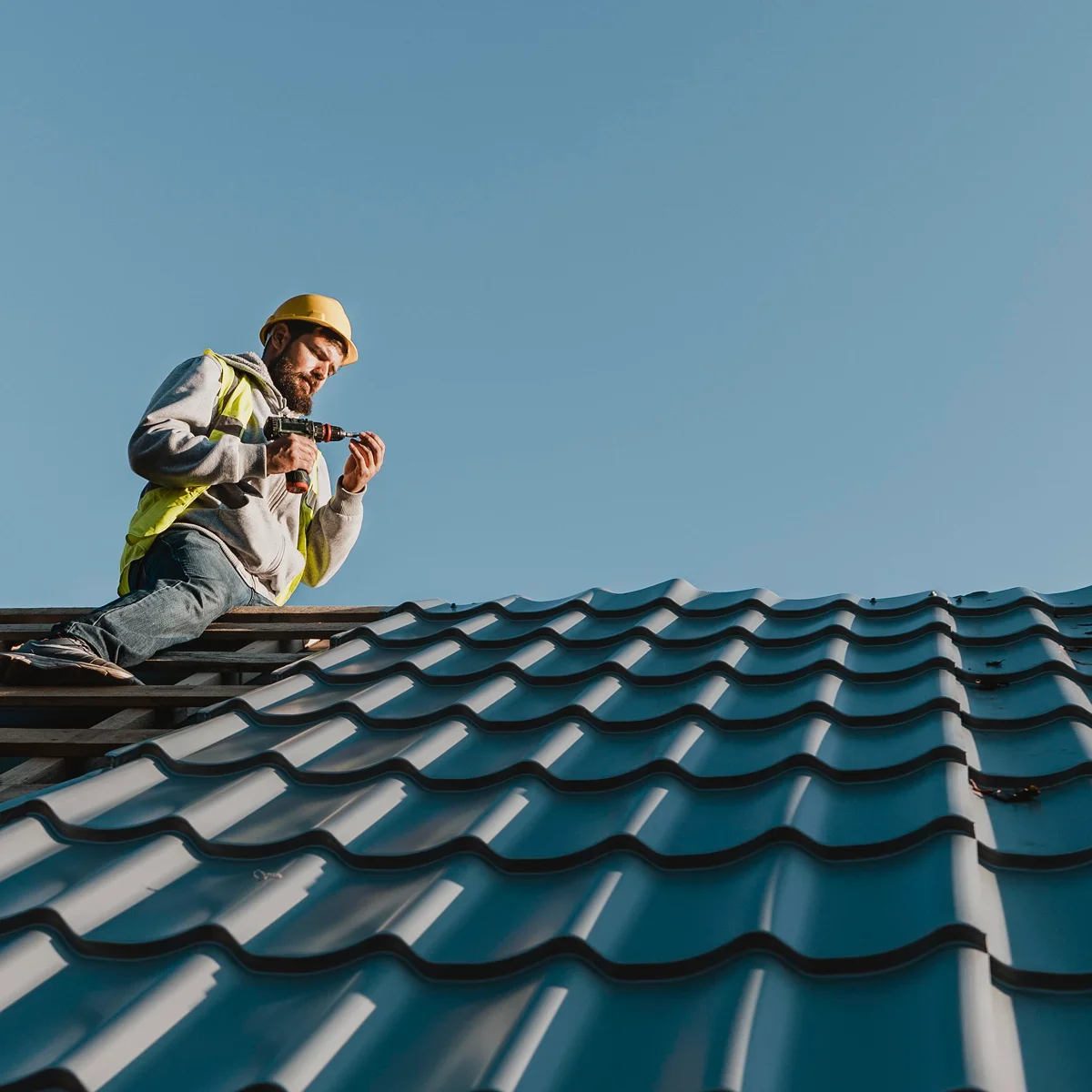 Roofer working on a residential roof