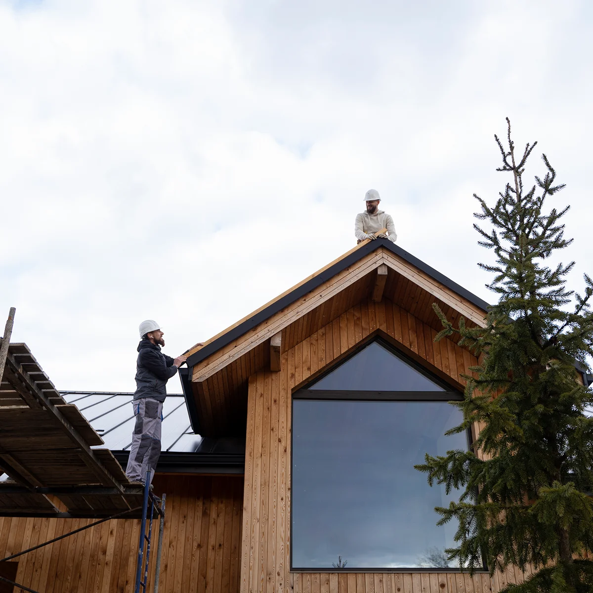 Roofing crew working together