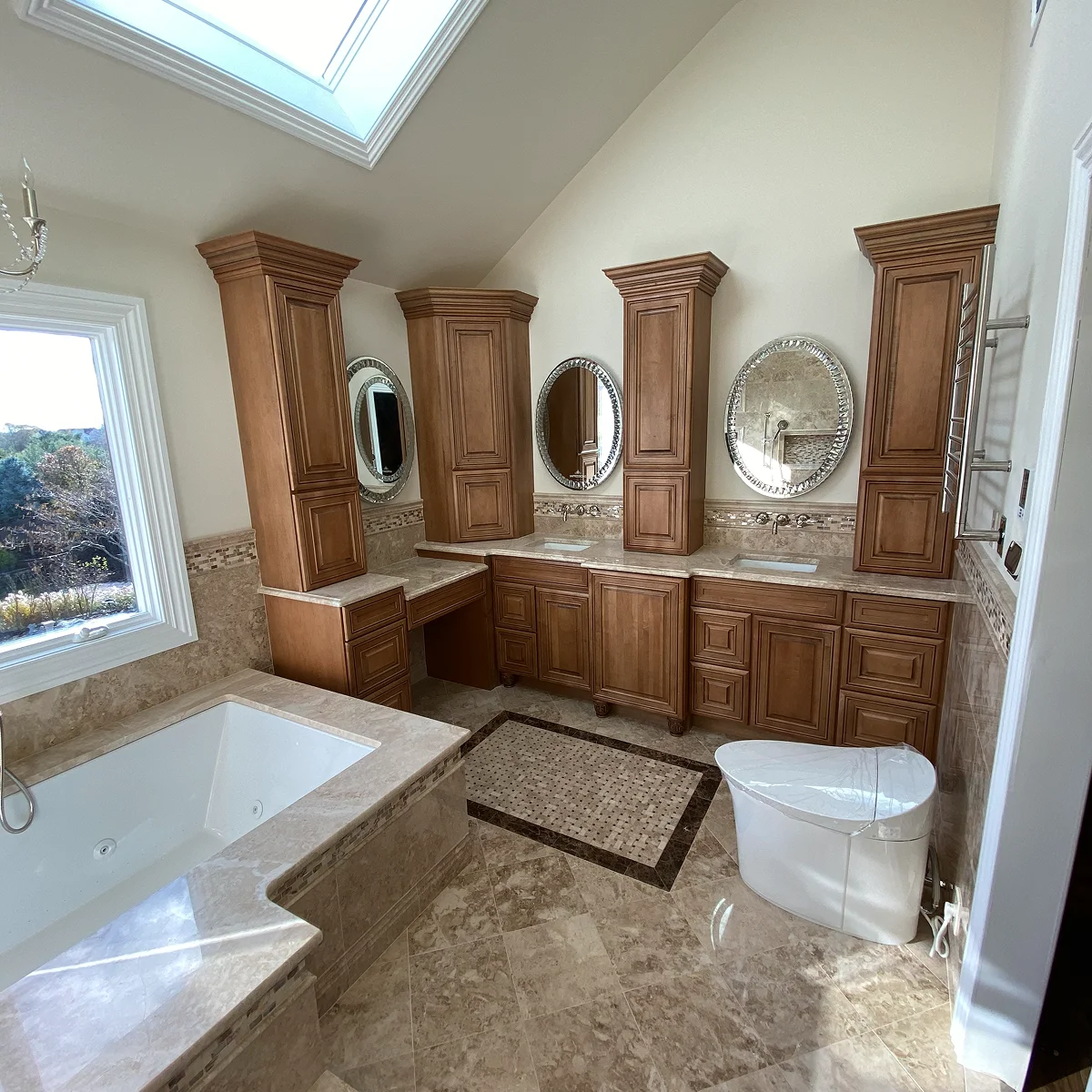Traditional wood triple vanity bathroom