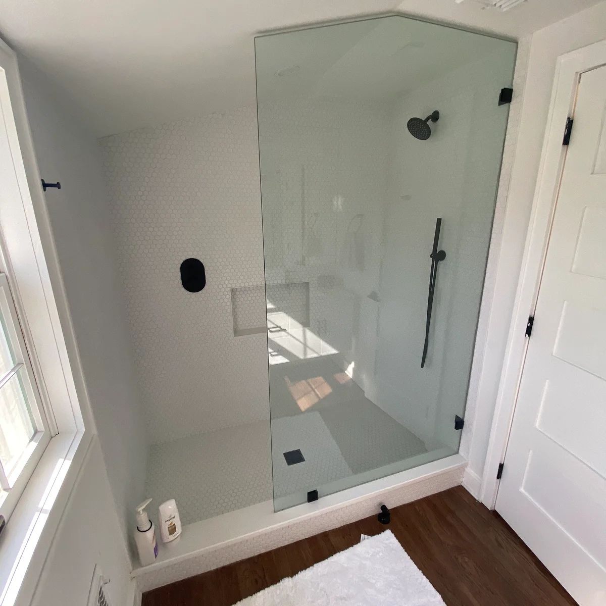White penny tile glass shower